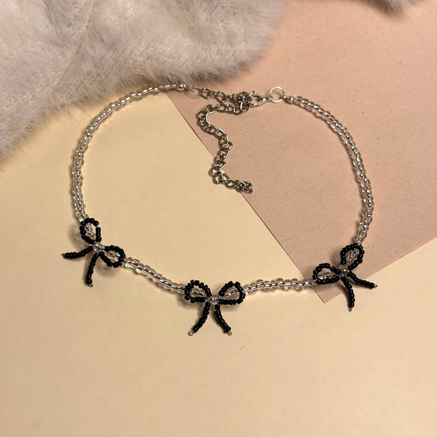 Black bow beaded choker