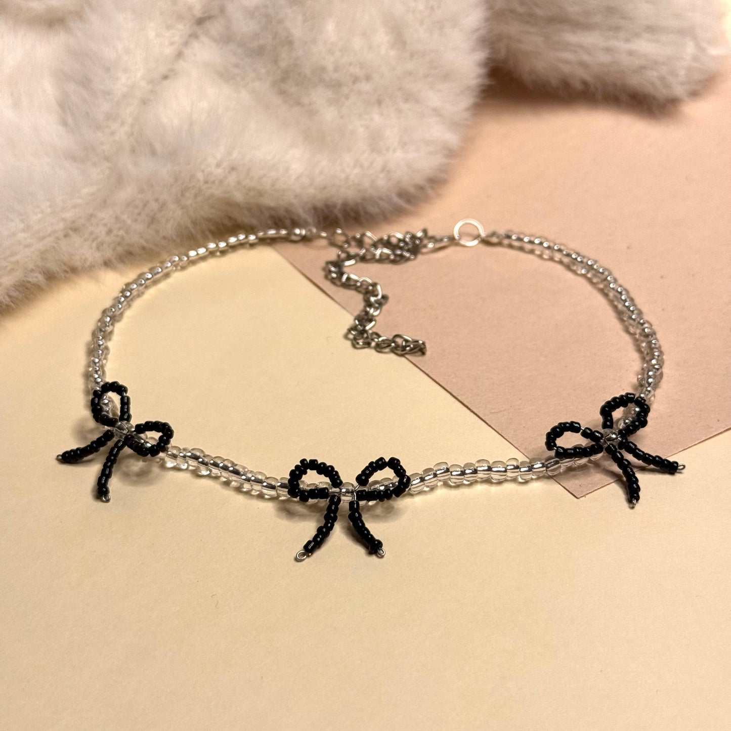 Black bow beaded choker